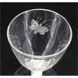 Pair of 18th century drinking glasses of possible Jacobite interest, the ogee bowls engraved with moth and initials 'G.G.', upon a double series opaque twist stems and conical feet, H12cm
