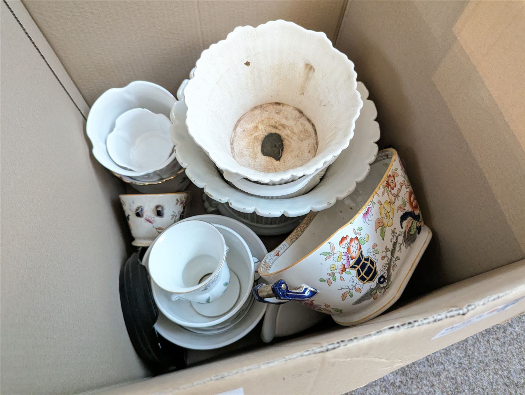 Three boxes of mixed porcelain planters, pots, jardenieres, stands, etc Provenance: from the Kirkham Hall estate.