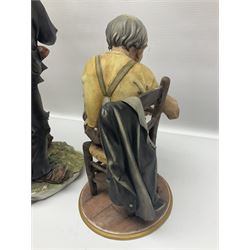 Three Capodimonte figures, to include The Kind Heart Man, modelled by Cortese as a tramp with two doves, The Young Falconer by Maria Angela and another modelled as a tramp darning his socks, all with printed marks, tallest H39cm