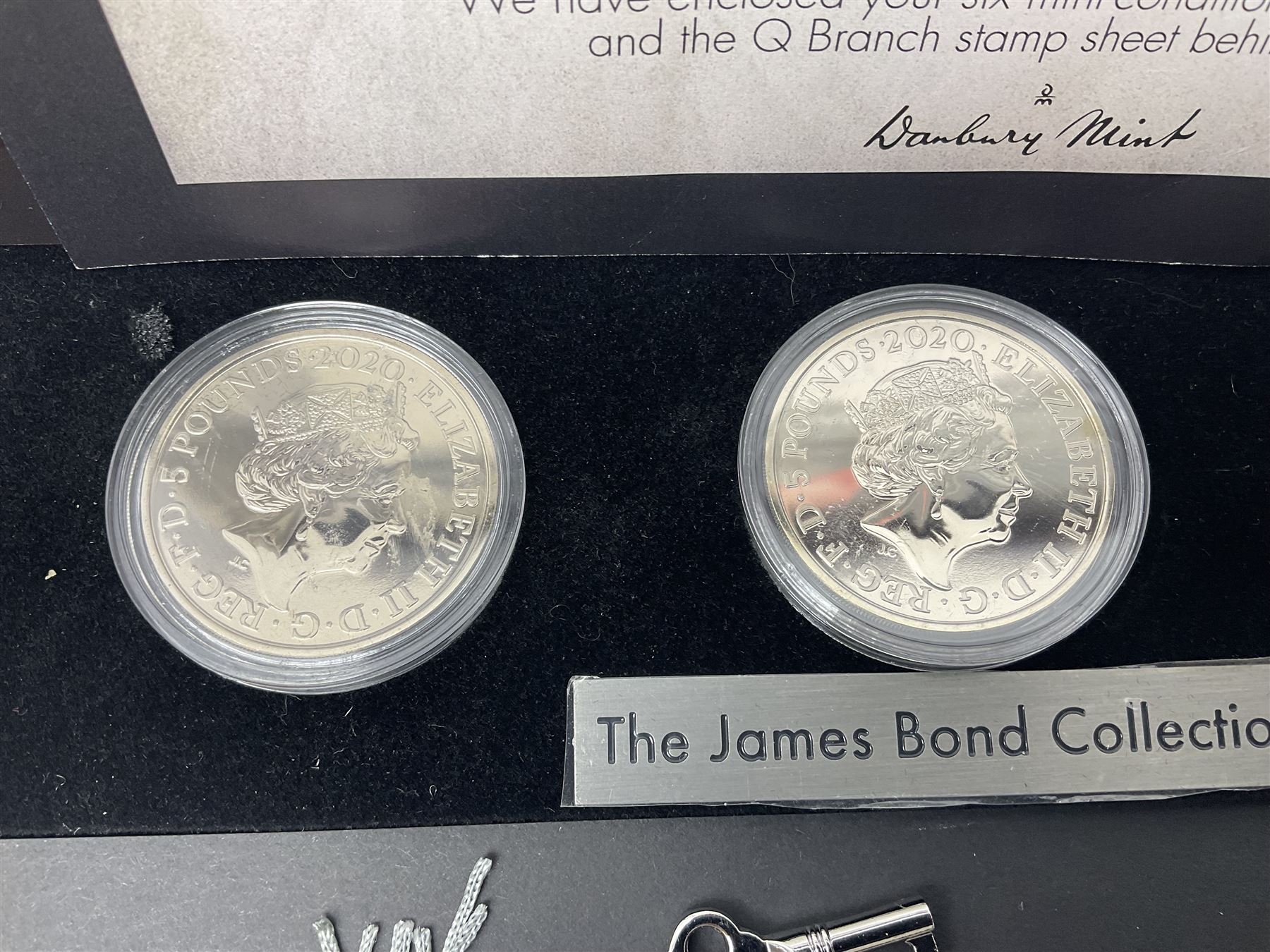 Danbury Mint 'The Ultimate James Bond Collection' comprising stamps and coins housed in a display case, 'Concorde Queen of the Skies' sculpture, stamps, medallion display and 2020 'Centenary of the Unknown Warrior' five pound coin cover in Harrington and Byrne folder