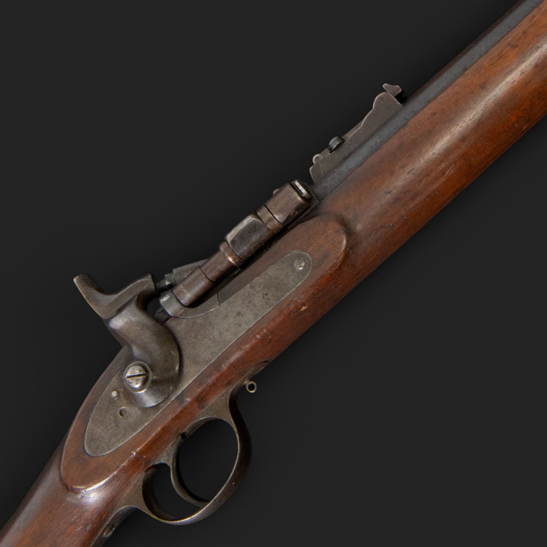 Snider-Enfield service rifle .577 calibre, barrel 33 in., tangent/ladder back sight, action marked with crowned V.R BSA & Co 1872, full stocked with two barrel bands, steel clearing rod, walnut stock marked Mx1 93 Birmingham, overall L124cm