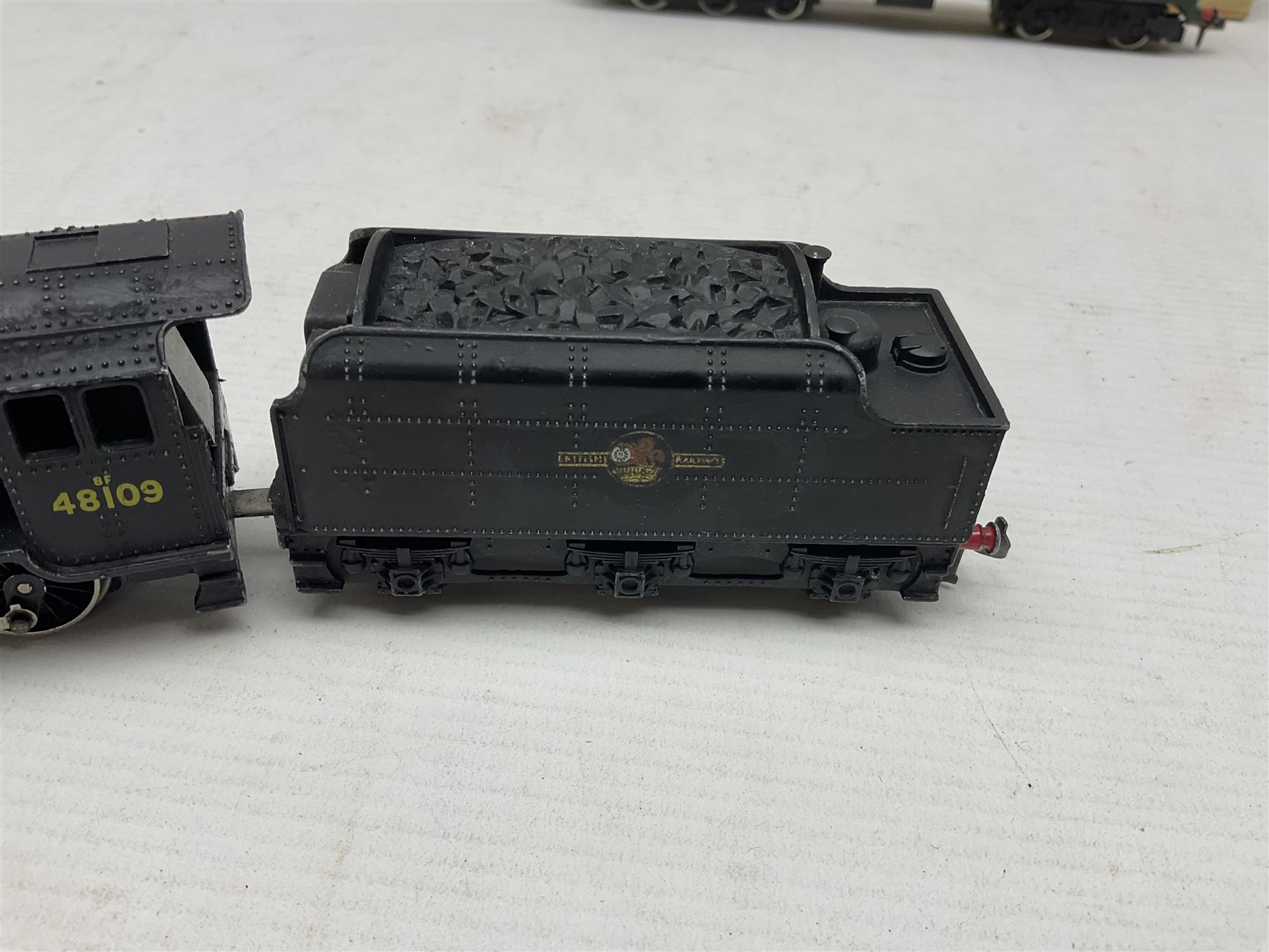 Hornby Dublo - 2-rail - Class 8F 2-8-0 locomotive No.48109 in BR black; Class R1 0-6-0 tank locomotive No.31337 in BR black; and Met-Vic Diesel Co-Bo locomotive No.D5702 in BR green; together with 3-rail Class 4MT Standard Tank 2-6-4 locomotive No.80054 in BR black; three unassociated boxes and one unboxed (4)