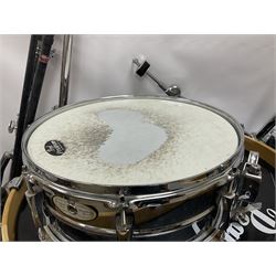 Pearl Vision SST Birch Ply shell four-piece drum kit in black comprising bass drum with foot pedal and three graduated toms; together with Pearl Custom Alloy Sensitone steel snare drum, drum and cymbal stands, microphone stand, stool and various drum sticks 