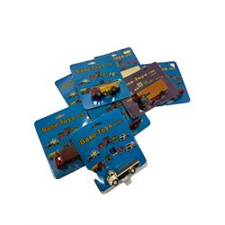 Twenty one Base Toys 1:76 scale diecast vehicles, all in original blister packs