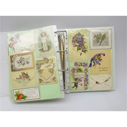  Modern ring binder album containing over three hundred and ten predominantly Victorian Christmas greeting cards, single sheet and folded, including embossed, applique, embroidered, floral, birds, chromolithograph, pierced and paper lace, novelty shapes of anvil, shield, flower-heads, horse shoe etc  