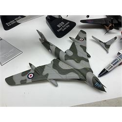 Thirteen unboxed Corgi Aviation Archive or similar die-cast models of aircraft, most with stands; Airfix 1:72 scale construction kit for BAe Harrier GR3; and two boxed Shell Collection die-cast models of cars