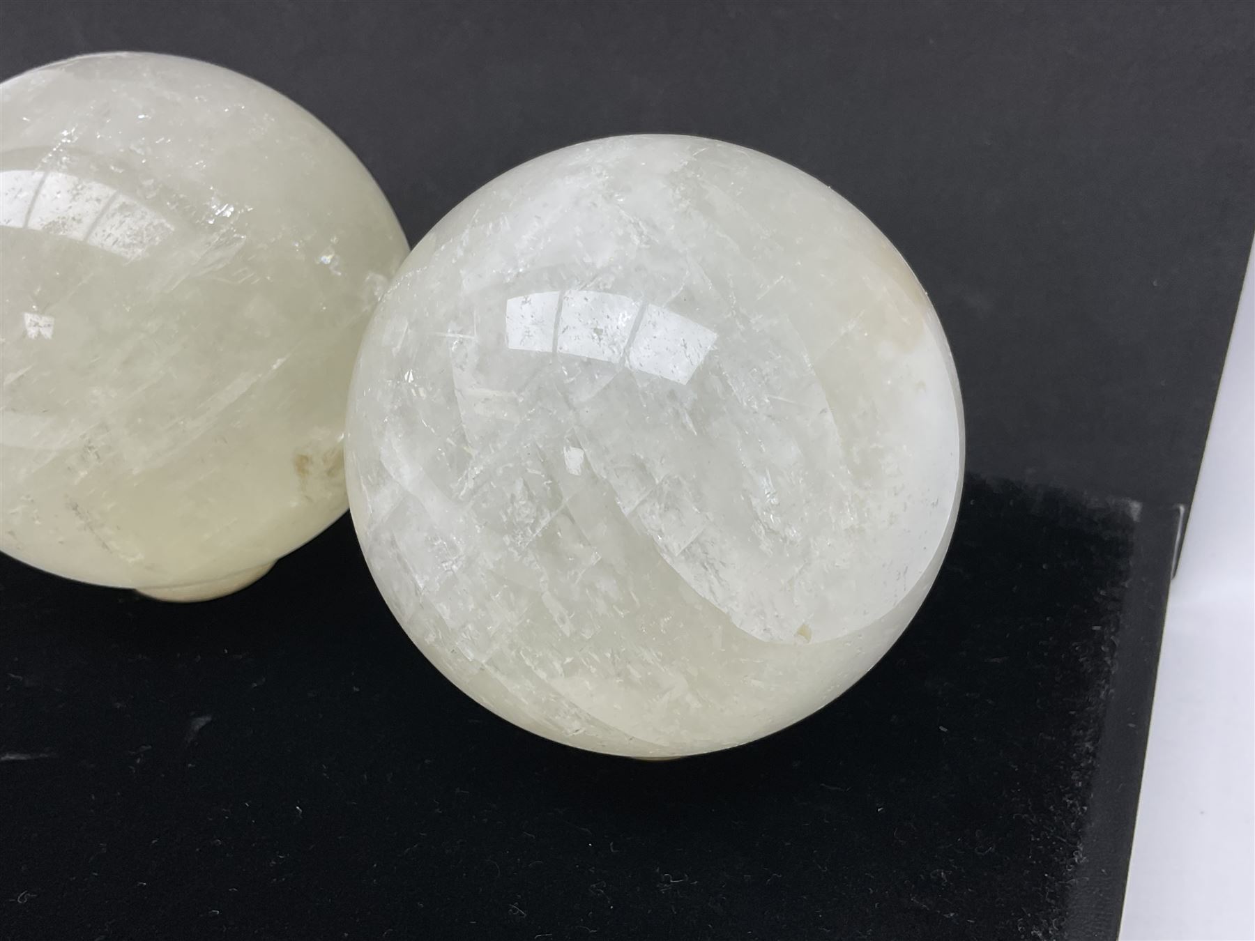 Set of three clear calcite spheres, D8cm