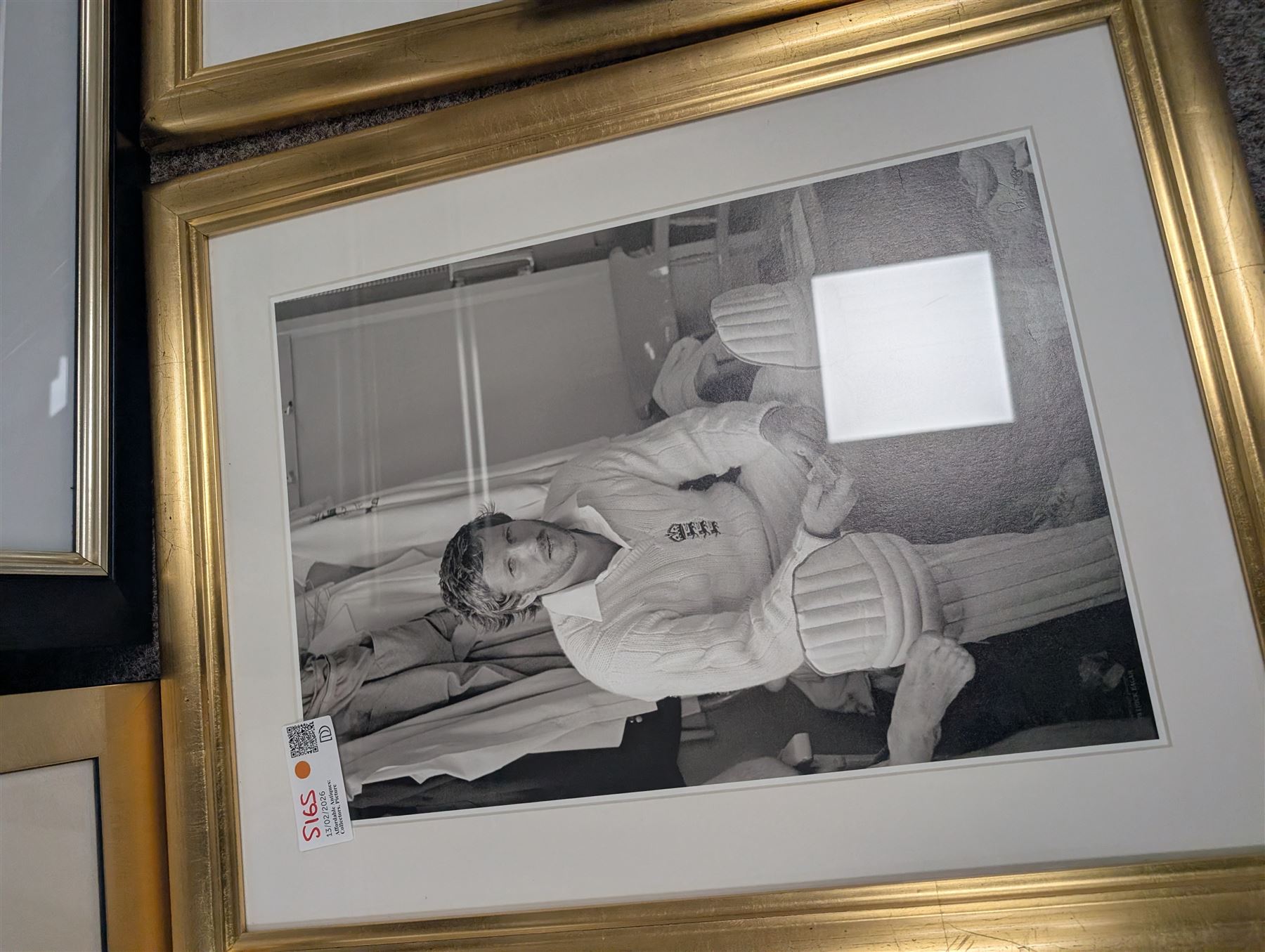 Collection of cricket memorabilia, including three black and white prints of Sir Ian Botham, colour print of Sir Ian Botham, signed limited edition Ashes Winners print, and a framed piece of The Times 1895, all framed, largest H70cm