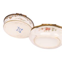 Four 19th century and later pill boxes, each decorated to the lid with floral sprigs, H3cm