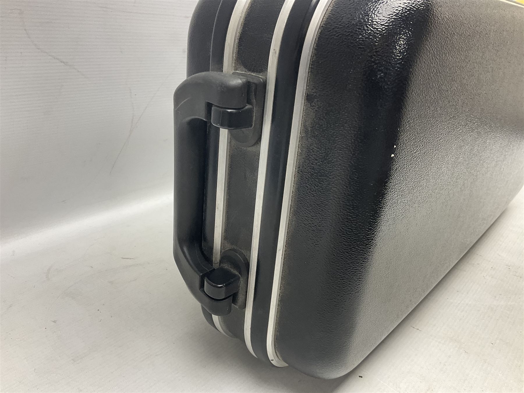 Lacquered brass 'King' alto saxophone inscribed Made by the H.N. White Co.' (Cleveland Ohio) with crook, serial no.84128; also stamped No.1 549 911 and Pat D 8-18-25; in fitted carrying case 