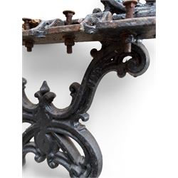 Carron Foundry - two pairs of 19th century cast iron garden bench ends, ornate detail with arms and X shaped legs,finish in black paint, the design no. 110396, first registered 13 July 1857 (see illustration), width as desired