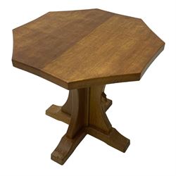 Mouseman - oak occasional table, octagonal adzed top on cruciform base with sledge feet, carved with mouse signature, by the workshop of Robert Thompson, Kilburn 