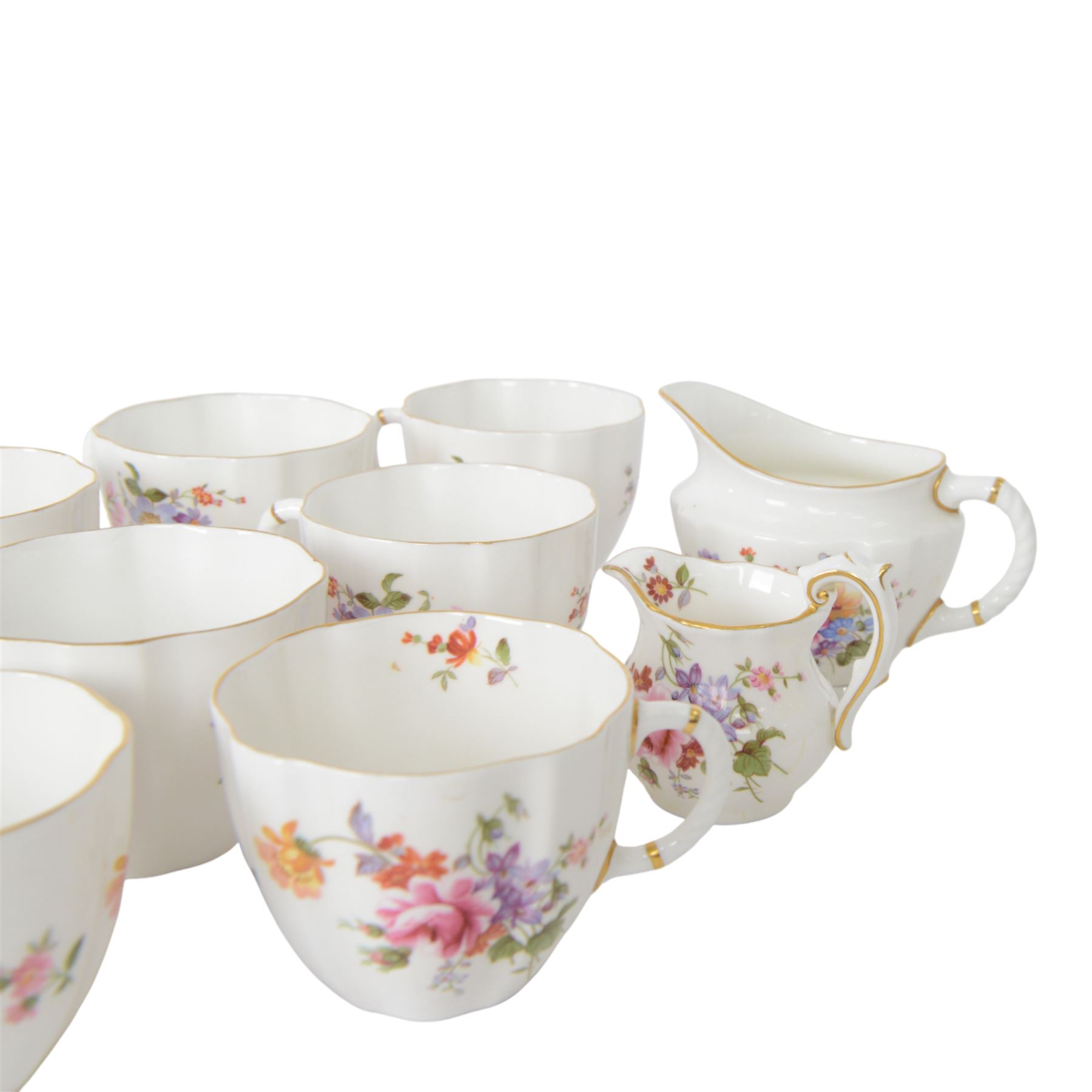 Royal Crown Derby Derby Posies tea service for ten, comprising teacups and saucers, dessert plates, two milk jugs, open sucrier cake plate and sandwich plate 