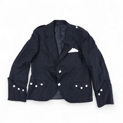 Piping regalia, comprising Armstrong tartan kilt with two kilt pins, three sporrans, including fur example, two jackets, Glengarry hat, other hats, collection of shirts, socks, ties, Hecsan shoes, dirk and belt