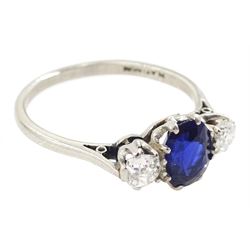 Early 20th century platinum three stone oval cut sapphire and old cut diamond ring, stamped, sapphire approx 1.10 carat, total diamond weight approx 0.30 carat