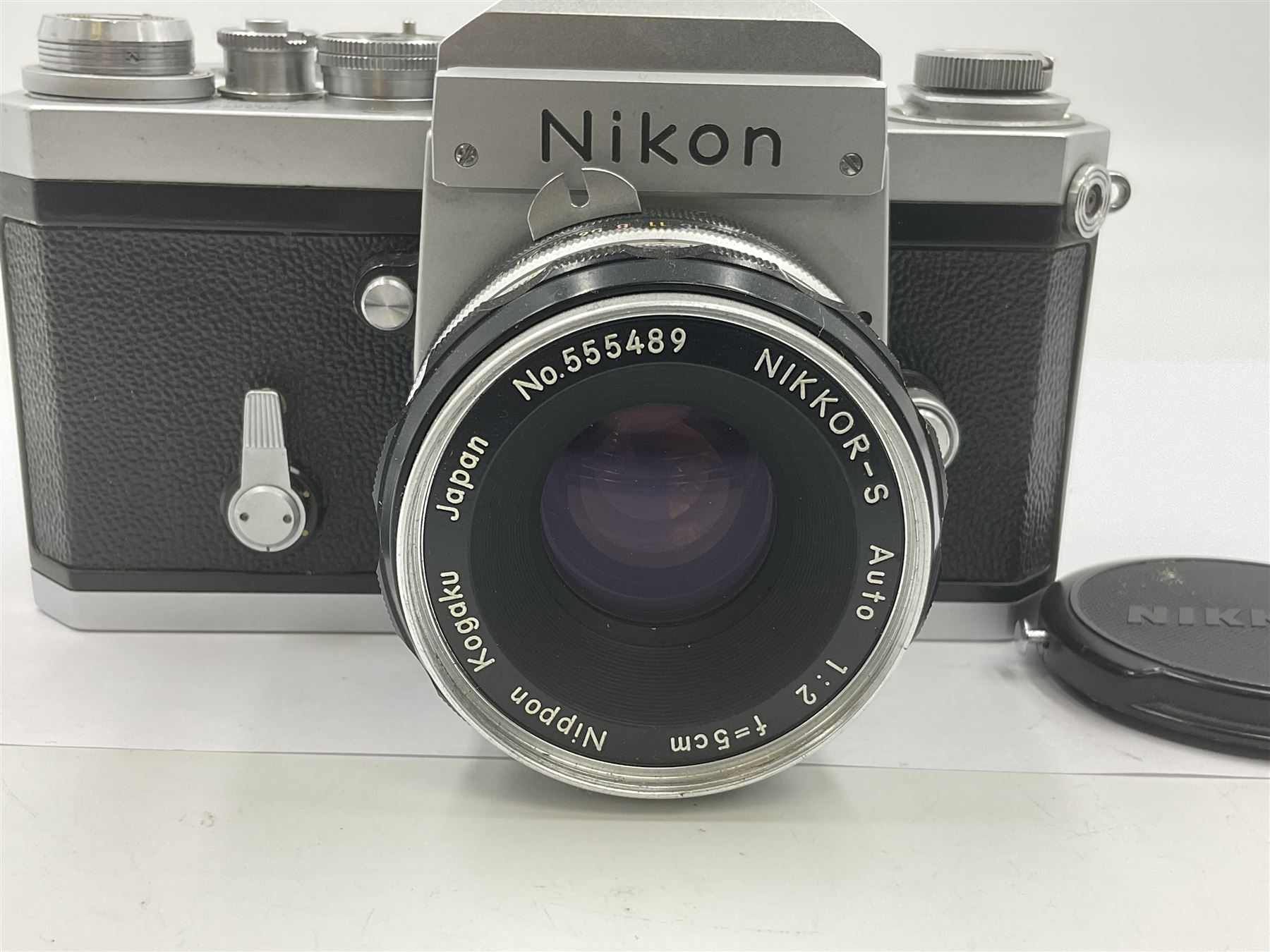 Nikon F 'Red Dot' NKJ plain prism camera body, serial no.6600892, circa 1965, with 'Nippon Kogaku Japan NIKKOR-S  Auto 1:2 f=5cm' len, serial no. 555489