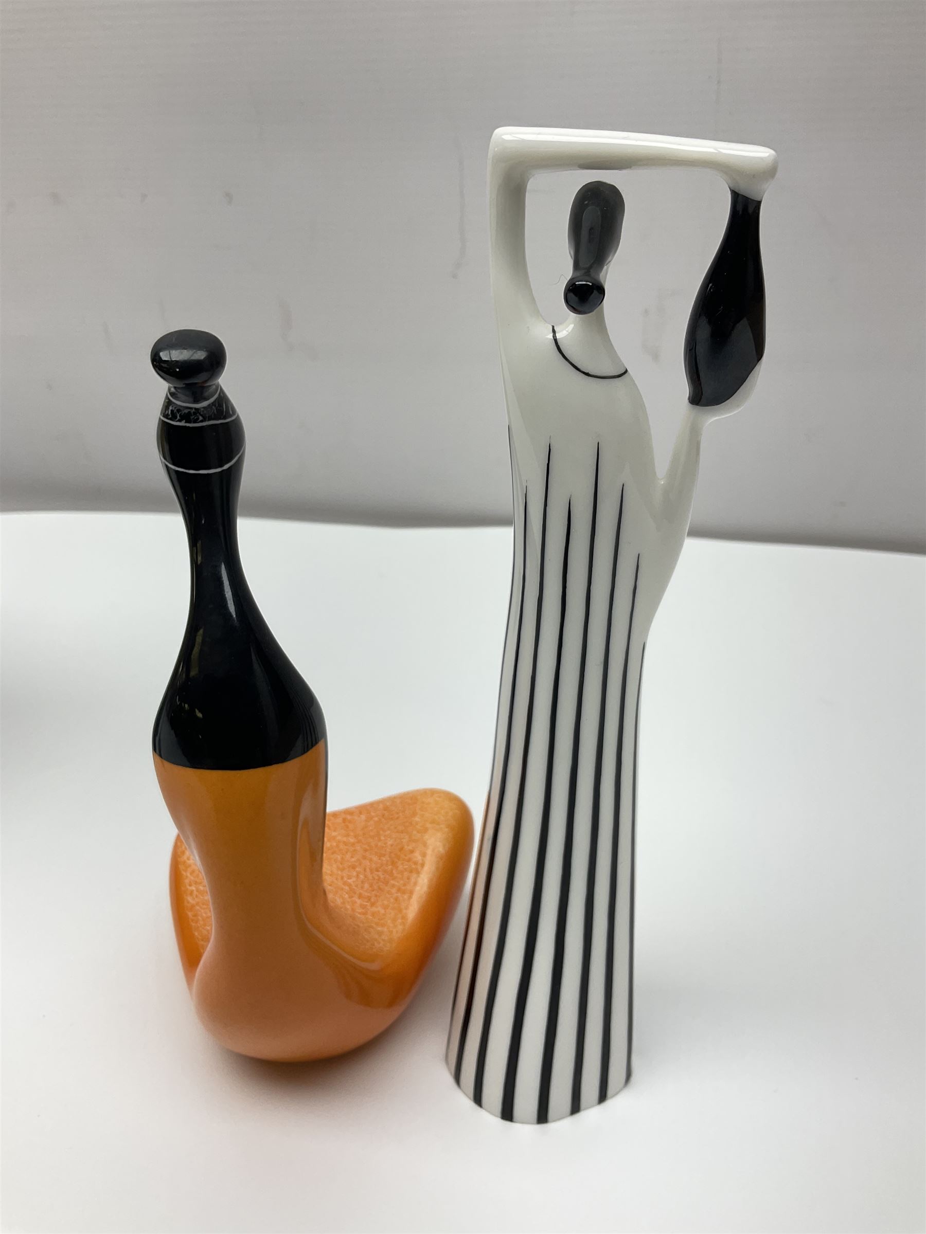 Dennis China Works vase with fluted rim together with three Cmielow figures and Beswick Silhouette vase of Girl with the Pearl earring, Beswick vase H22cm 