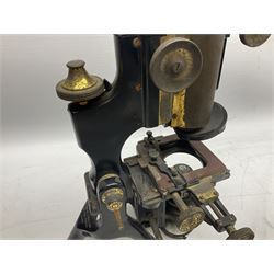 19th century brass and black japanned monocular microscope by W. Watson & Sons Ltd. 313 High Holborn, London serial no.24788 with rack and pinion focussing on tripod base H31cm; in fitted mahogany case retailed by A.H. Baird Scientific Instrument Makers Edinburgh; quantity of additional lenses and accessories; together with another similar uncased monocular microscope by W. Watson serial no.58379 (2)