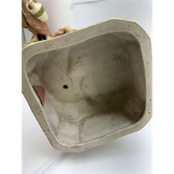 Pair of Royal Dux figures, no. 1115, modelled as a shepherd with a goat by his side and a shepherdess feeding a lamb, each wearing flowing green and pink robes with gilt detailing, with pink triangle mark beneath, H51cm