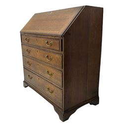 Georgian oak and mahogany banded bureau, fitted with fall front revealing fitted interior, above four graduating drawers