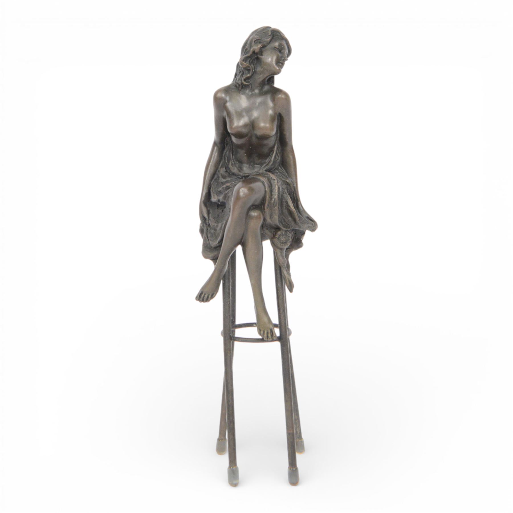 Art Deco style bronze modelled as a semi naked female figure, seated upon a chair, after 'Pierre Collinet', H27cm