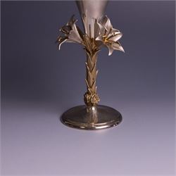 Modern limited edition silver goblet, 'made by order the provost and charter of Blackburn to commemorate the fiftieth anniversary of the cathedral in 1976 and its consecration in 1977' designed by Hector Miller for Aurum, the plain fluted cup, upon a stem of three lillies with parcel gilt highlihts and upon a circular foot, no. 2/750, hallmarked Hector Miller, London 1977, H17cm, boxed with certificate of authenticity