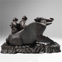 Early 20th century Chinese carved hardwood figural group of two boys on the back of a water buffalo on wooden stand W37cm