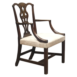  George lll mahogany elbow chair, with serpentine top rail, interlaced scrolled splat and curved arm supports, stuffed over seat on square supports with inner chamfer joined by an H stretcher, H95cm, D52cm  
