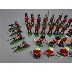  Forty die-cast figures of soldiers by Britains etc including some with articulated arm, ceremonial uniform, Scots regiment etc  