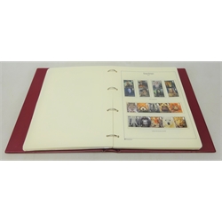  Approximately 480 GBP face value of unused postage including many 1st class stamps, in one album  