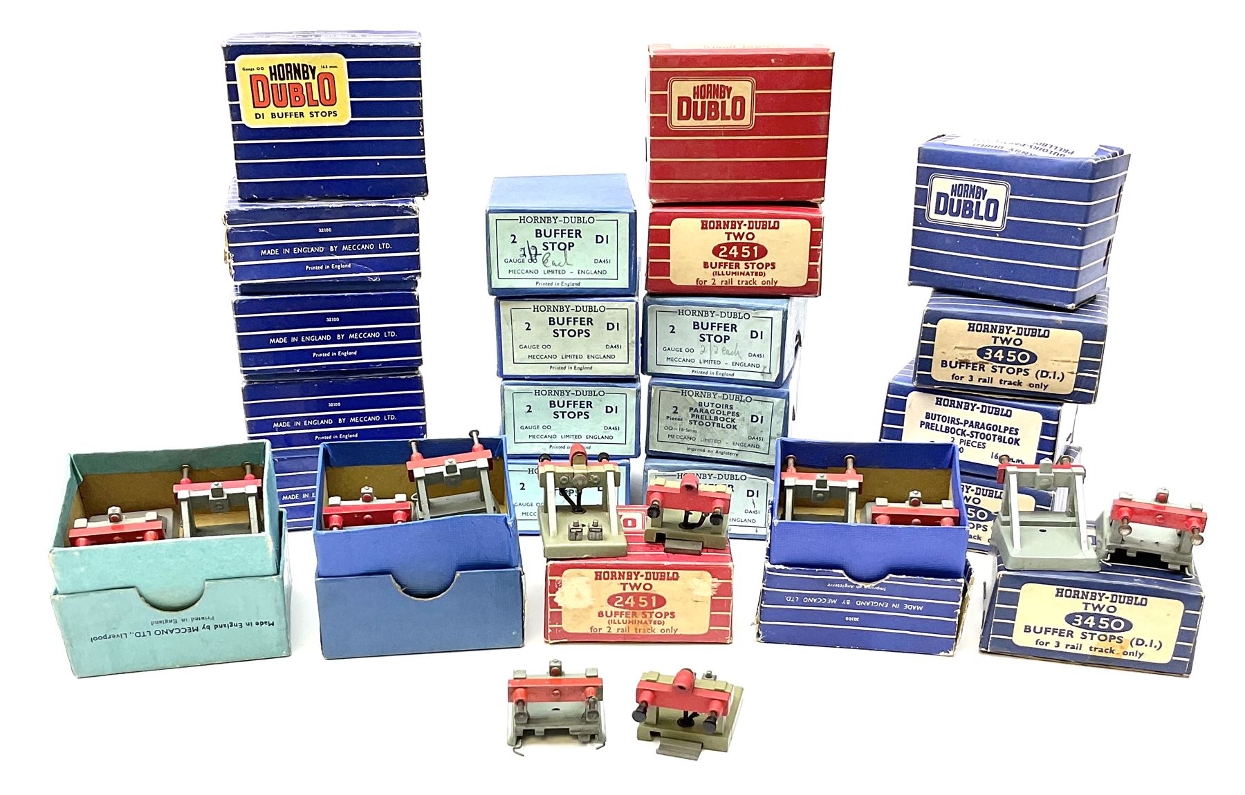 Hornby Dublo - twenty-three pairs of buffer stops including three pairs of 2451 Illuminated for two-rail track; five pairs of 3450 for three-rail track only; and fifteen D1 pairs; all boxed; and two odd loose buffers (21)