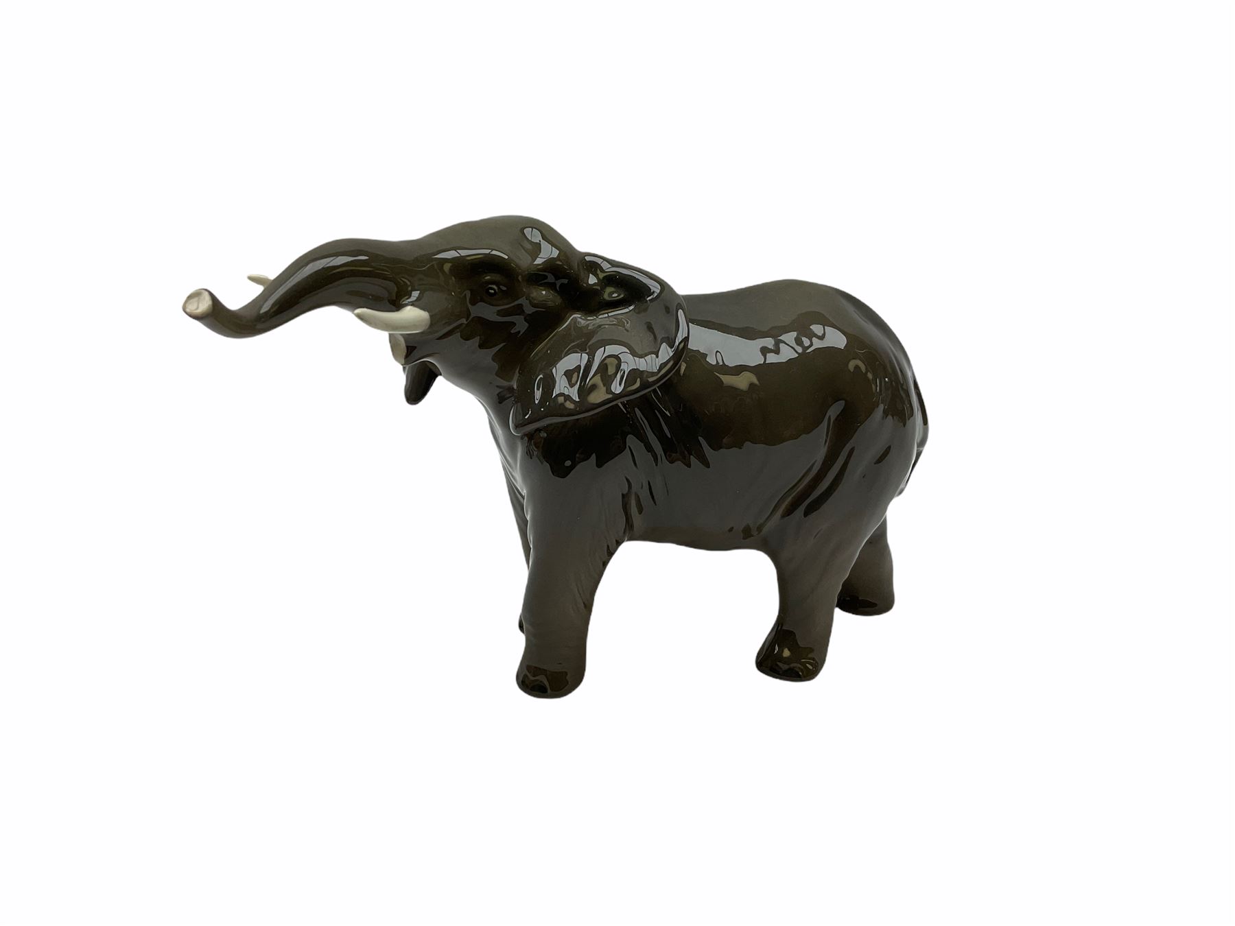 Beswick figures, comprising Afghan Hound 2285, St Bernard 'Corna Garth Stroller' 2221, Rottweiler 3056, Greatdane 'CH Ruler of Ouborough', Fox, Elephant, and dappled grey type horse. 