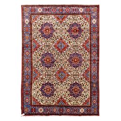 West Persian Hamadan hand-knotted rug, ivory field decorated with a repeating lattice of s...