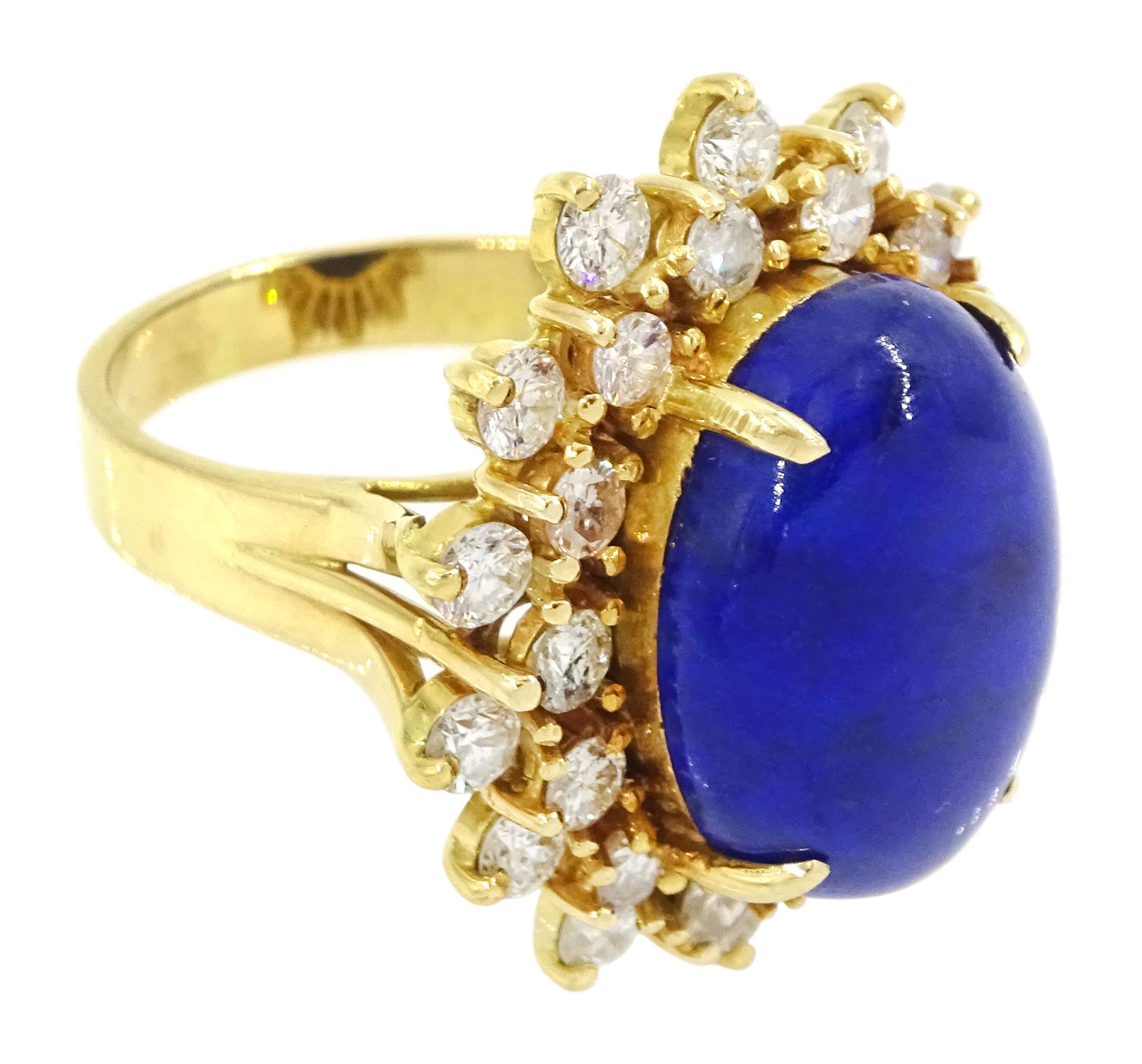 18ct gold lapis lazuli and diamond cluster ring, single oval cut lapis lazuli with two rows of round brilliant cut diamonds, stamped 750, total diamond weight approx 1.70 carat