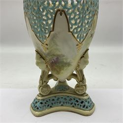 19th century Royal China Works Worcester pot pourri vase and cover of ovid form raised on three scrolling legs headed with lion masks and upon a triform reticulated base, printed marks beneath, H24cm