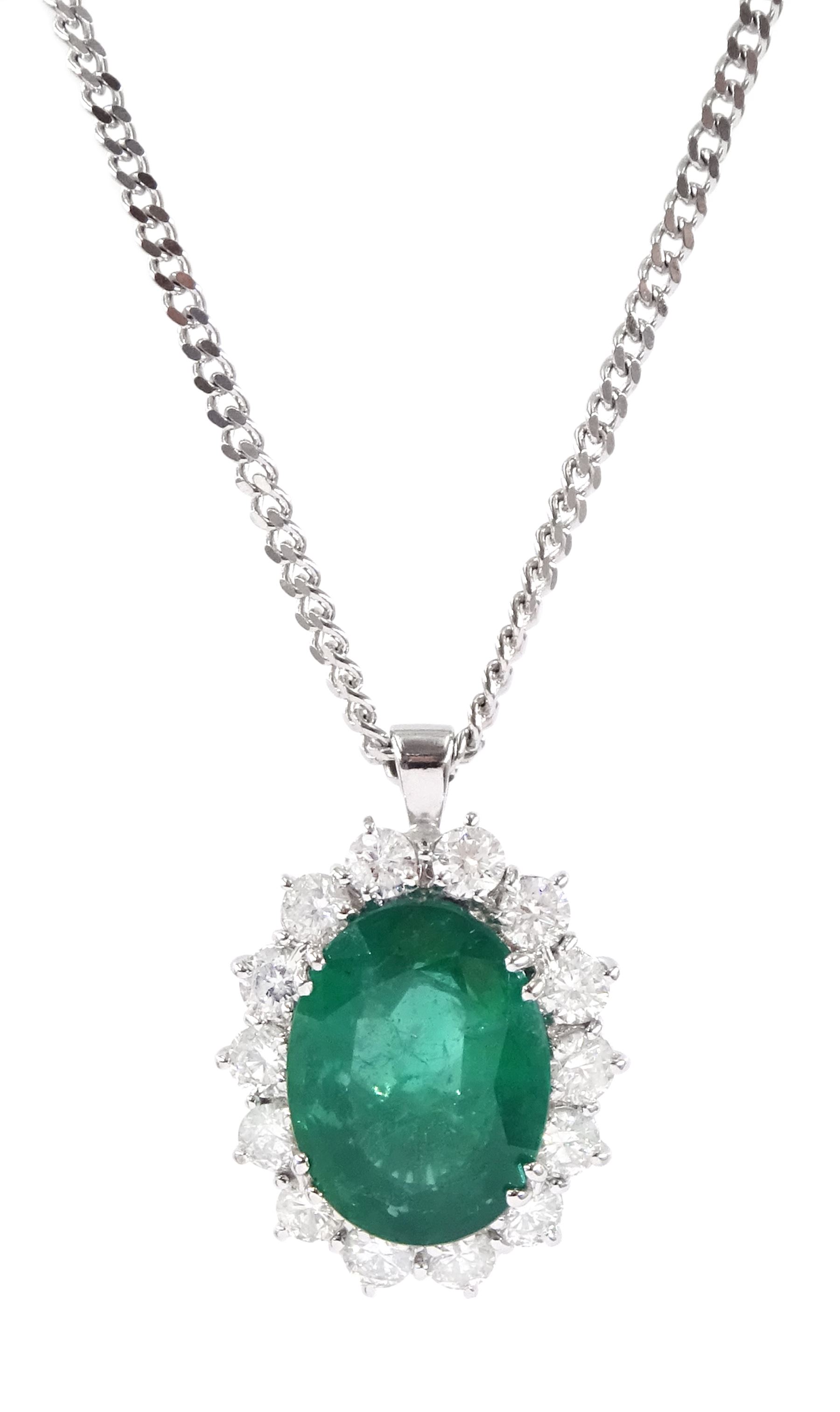 18ct white gold oval cut emerald and round brilliant cut diamond, cluster pendant necklace, hallmarked, emerald approx 4.00 carat