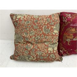 Collection of predominantly Chinese style cushions, to include feather down examples