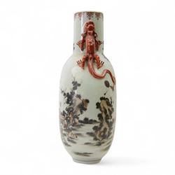 Chinese Republic period porcelain moon flask vase, of typical compressed spherical form, the neck and shoulders with applied iron red dragon handles, the body decorated in iron-red and grisaille with a 'one hundred children' design, depicting various children at play and engaged in musical pursuits within a garden setting, with apocryphal Qianlong mark beneath, H47cm