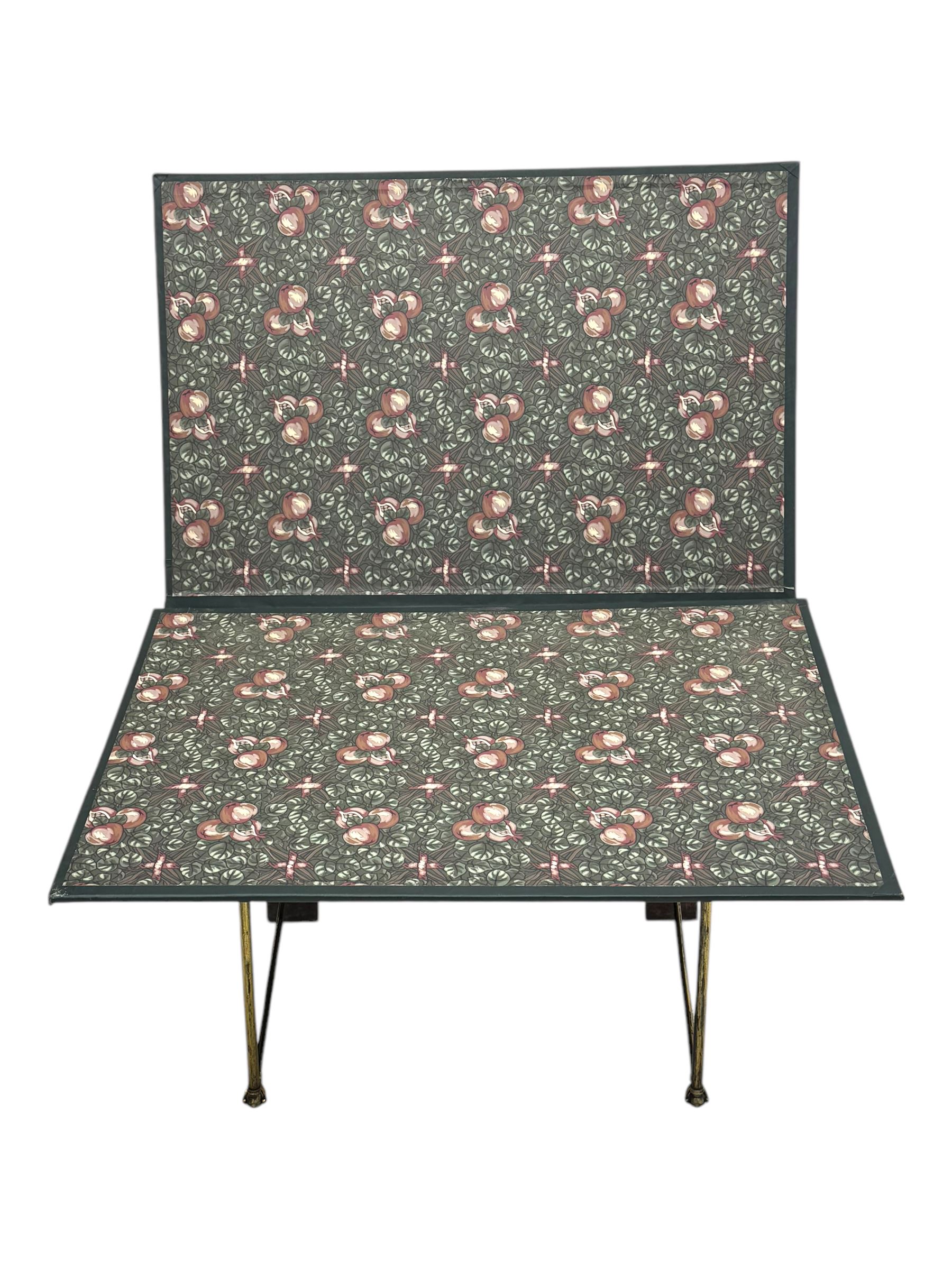 Late 20th century mahogany folding folio stand, the angled top and fold-out shelf decorated with a William Morris-style pomegranate and foliage pattern, supported by a folding A-frame structure