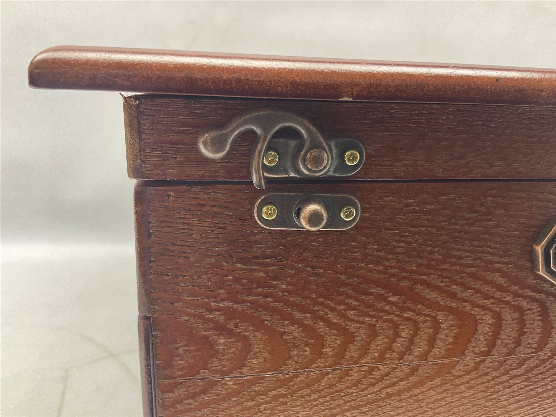 Waltmann und Sohn part canteen of stainless steel and gilt cutlery, the stained wood case with hinged lid above two fitted drawers, L48cm