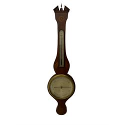 A William IV mercury wheel barometer c1830 with an inlaid broken pediment, brass finial and round base, mahogany veneered case with inlaid oval conch shell paterae and satinwood stringing to the edge, with a spirit thermometer, eight-inch silvered register reading barometric pressure in inches from 28  to 31, dial inscribed “I VERA, WARRENTED”, with a bevelled glass within a cast brass bezel, steel indicating hand and brass recording hand.




