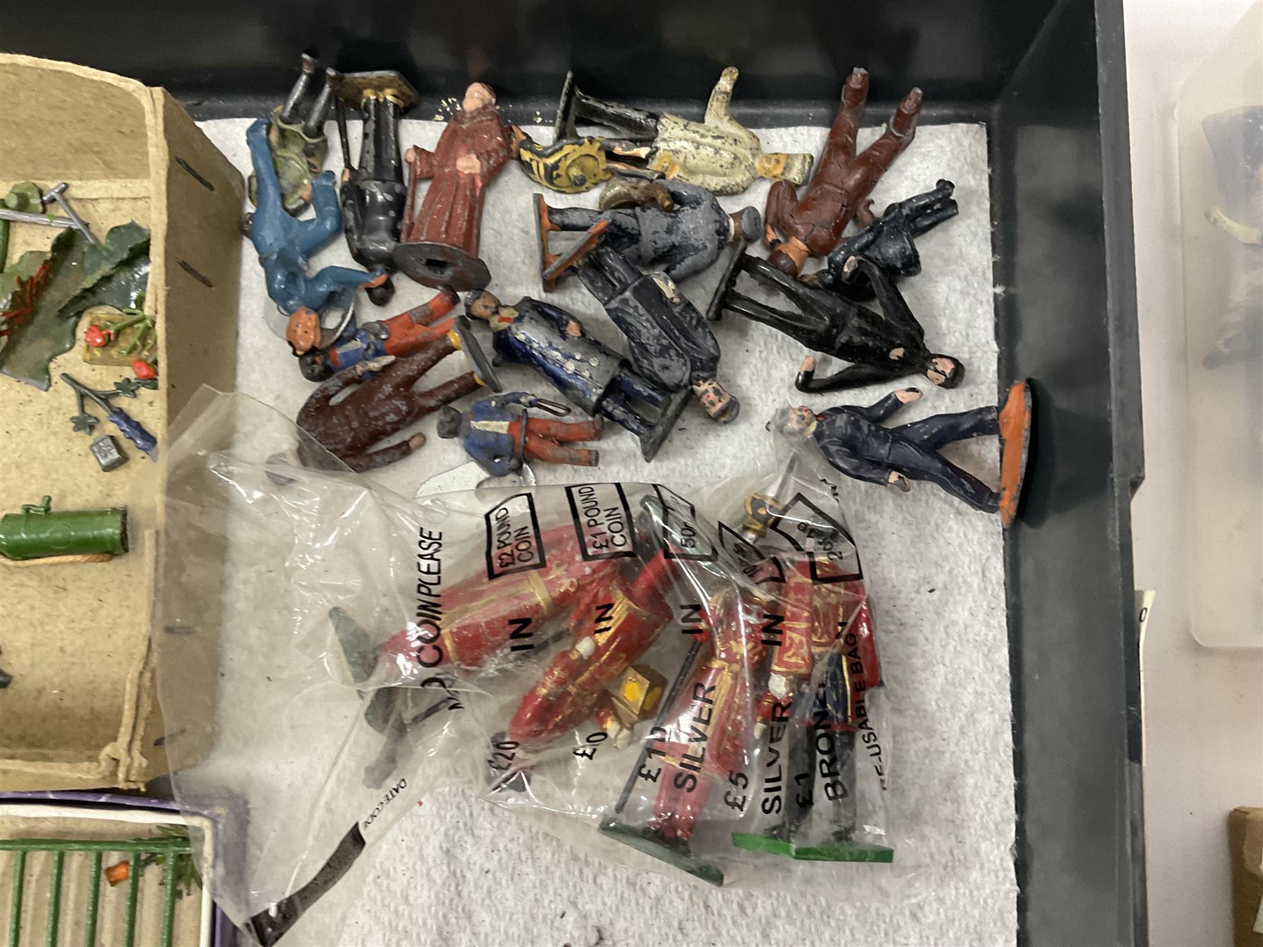 Large quantity of playworn 1950s Britains and other lead figures including farm and zoo animals, horse drawn carts, fencing etc