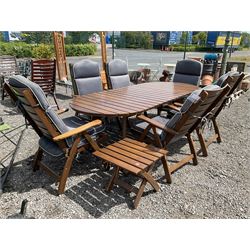 “Bohor ” hardwood oval extending garden table and six folding chairs with folding side table  - THIS LOT IS TO BE COLLECTED BY APPOINTMENT FROM DUGGLEBY STORAGE, GREAT HILL, EASTFIELD, SCARBOROUGH, YO11 3TX