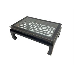 Chinese ebonised rectangular coffee table, inset glass top over pierced geometric fretwork, raised on shaped supports