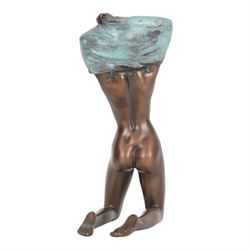 Bronze figure, modelled as a nude woman removing her shirt, signed Milo, H17cm