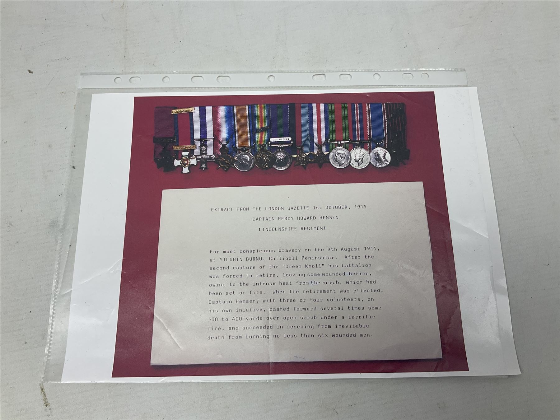 Captain (later Brigadier) Percy Howard Hansen V.C., D.S.O., M.C. 6th (Service) Battalion Lincolnshire Regiment - representative group of thirteen miniature dress medals comprising VC, DSO, MC, WW1 trio, GSM with Palestine clasp, four WW2 medals/stars, George VI Coronation Medal and French Croix-De-Guerre with MID leaves; all with ribbons on pinned bar for wearing; together with display of contemporary tunic ribbon bars for eight medals, framed with Lincolnshire Regiment cap badge, newspaper cutting and London Gazette extract; framed head and shoulder portrait of Hansen in uniform clearly showing his medal bars; and copies of related biographical information. Auctioneer's Note: Extract from the London Gazette 1st October 1915 regarding the VC 'For most conspicuous bravery on the 9th August 1915, at YILGHIN BURNU Gallipoli Peninsular. After the second capture of the 