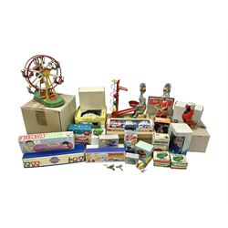 Twenty six tinplate models to include Ferris Wheel and Performing Circus Elephant, marked JW, further similar examples such as Duck on a Bike, Clown on Roller, Carousel; Popeye Tin Speedboat; Looney Tunes Wind Up Cars and Express Train; various international examples, MS107 Jumping Bambi, Pop Pop Boat, jumping frogs, pecking chickens etc; both boxed and loose