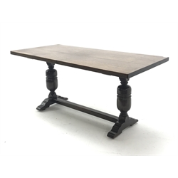  20th century oak refectory table, on two cup and cover baluster supports connected by stretcher, 169cm x 81cm, H78cm  