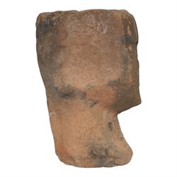 Sandstone carving, modelled as a stylised anthropomorphic head with simple facial features, H30cm