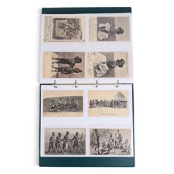 Collection of mid 20th century and later African postcards, including railways, Victoria Falls, Tribes, village scenes, etc, some blank and some with written messages, housed in two albums